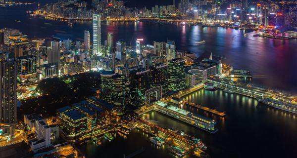 Victoria Harbour and the towers of Hong Kong seen from above Kowloon