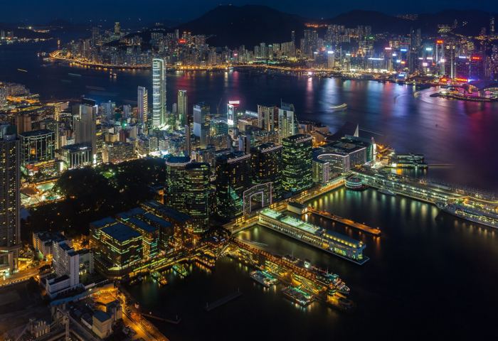 Victoria Harbour and the towers of Hong Kong seen from above Kowloon
