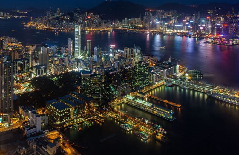 Victoria Harbour and the towers of Hong Kong seen from above Kowloon