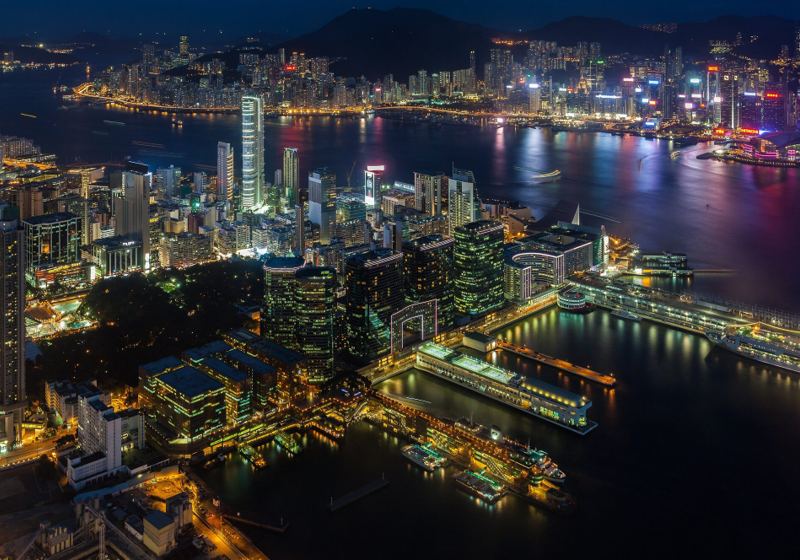 Victoria Harbour and the towers of Hong Kong seen from above Kowloon