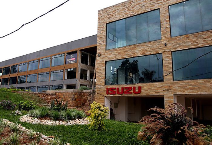 The Airport Boulevard frontage of Masterpiece Mall, with the Isuzu showroom at street level