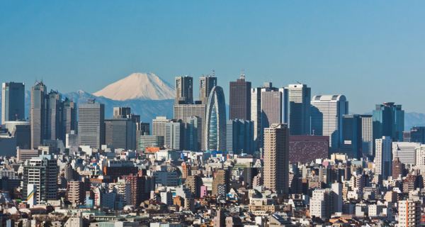 The skyscrapers of Shinjuku, Tokyo, with Mount Fuji behind them